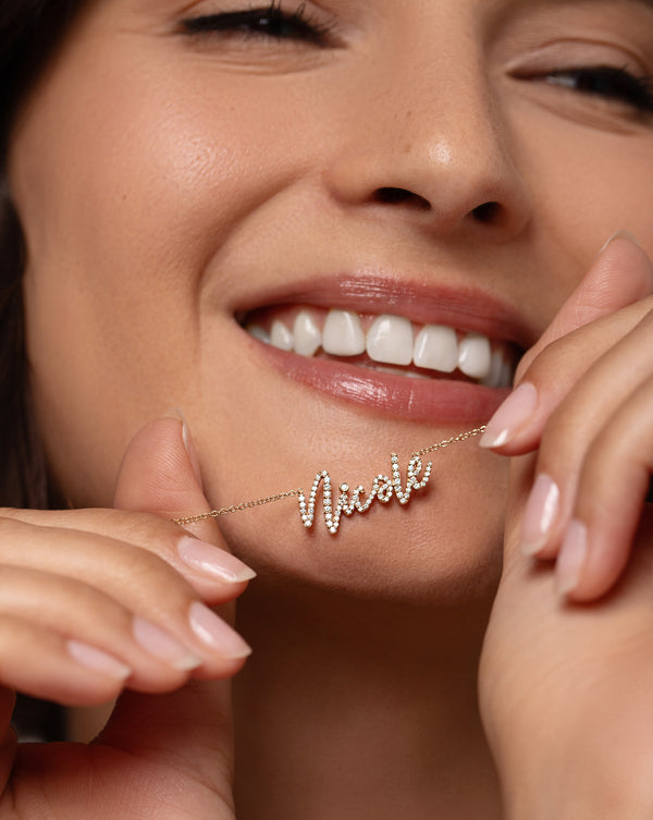 diamond script necklace with the name Nicole shown on model