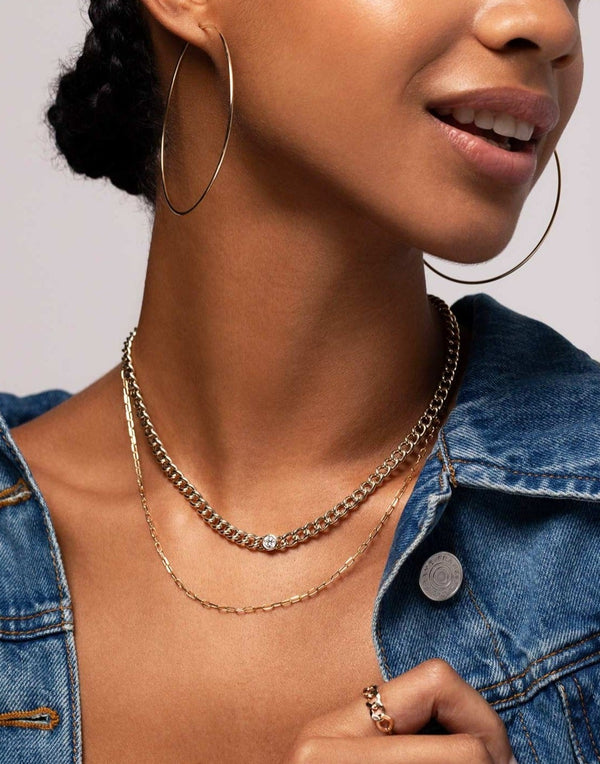 Bezel-Set Diamond Curb Chain Necklace, Mini link chain necklace, 1mm gold tube hoops on model wearing denim jacket and white shirt