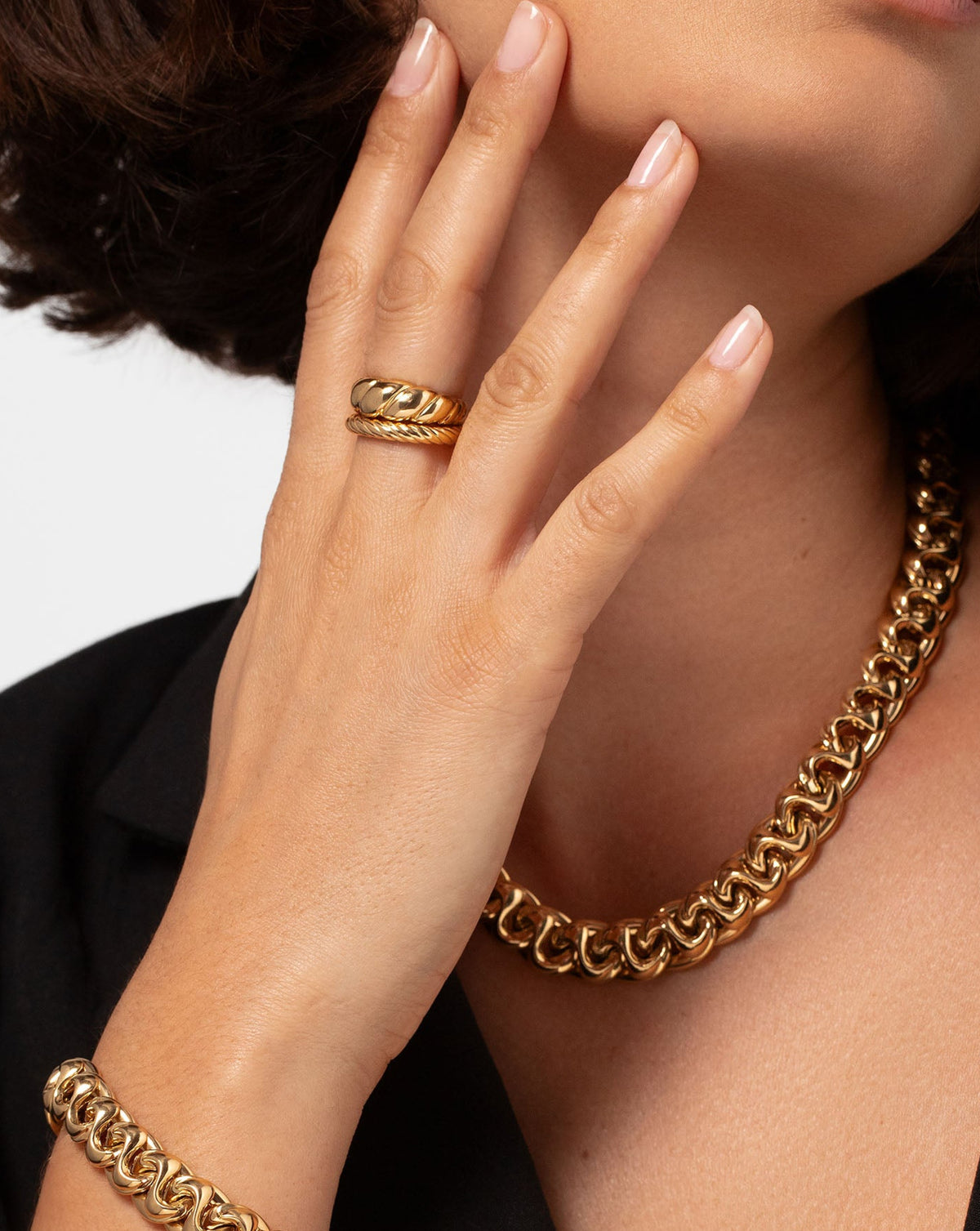 Ring Concierge twisted cable ring - on-model wearing 2 gold rings, 2 gold bracelet and 1 gold necklace
