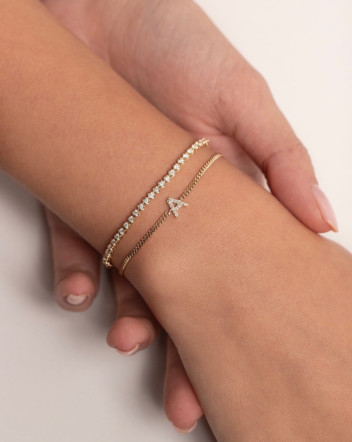 Mini diamond tennis bracelet in 14k yellow gold with diamond initial bracelet