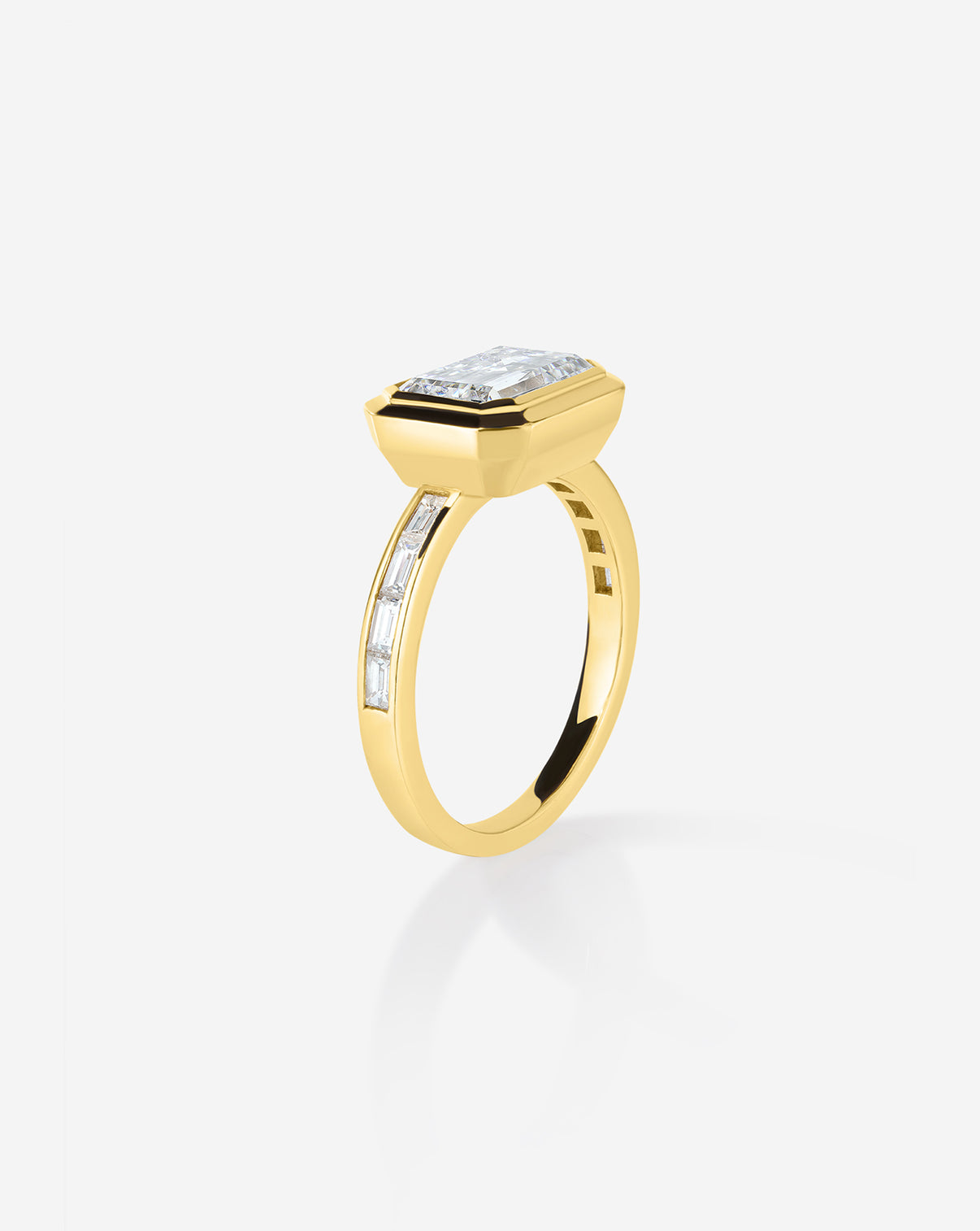 3 carat East West Emerald Diamond Channel Set Engagement Ring 14K Yellow Gold side view