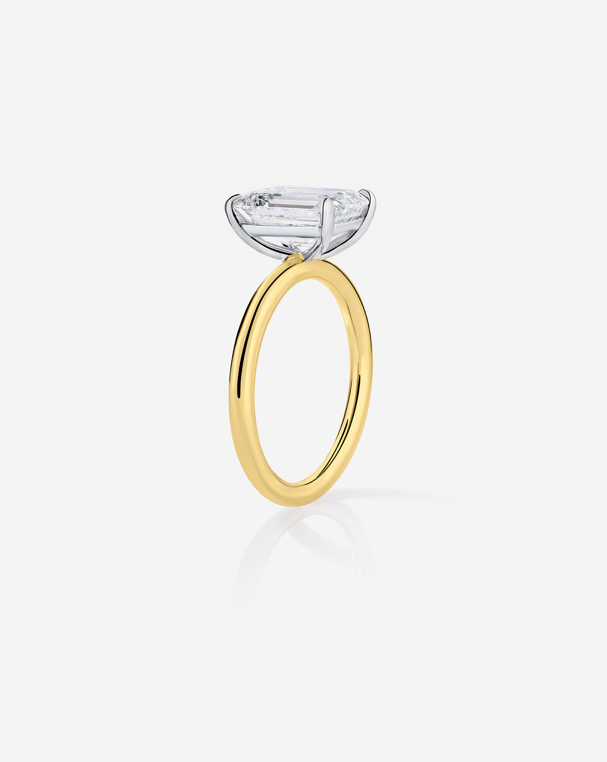 side angle of 3 carat Emerald Diamond Cloud Solitaire Engagement Ring | 14k yellow gold w/ platinum prongs