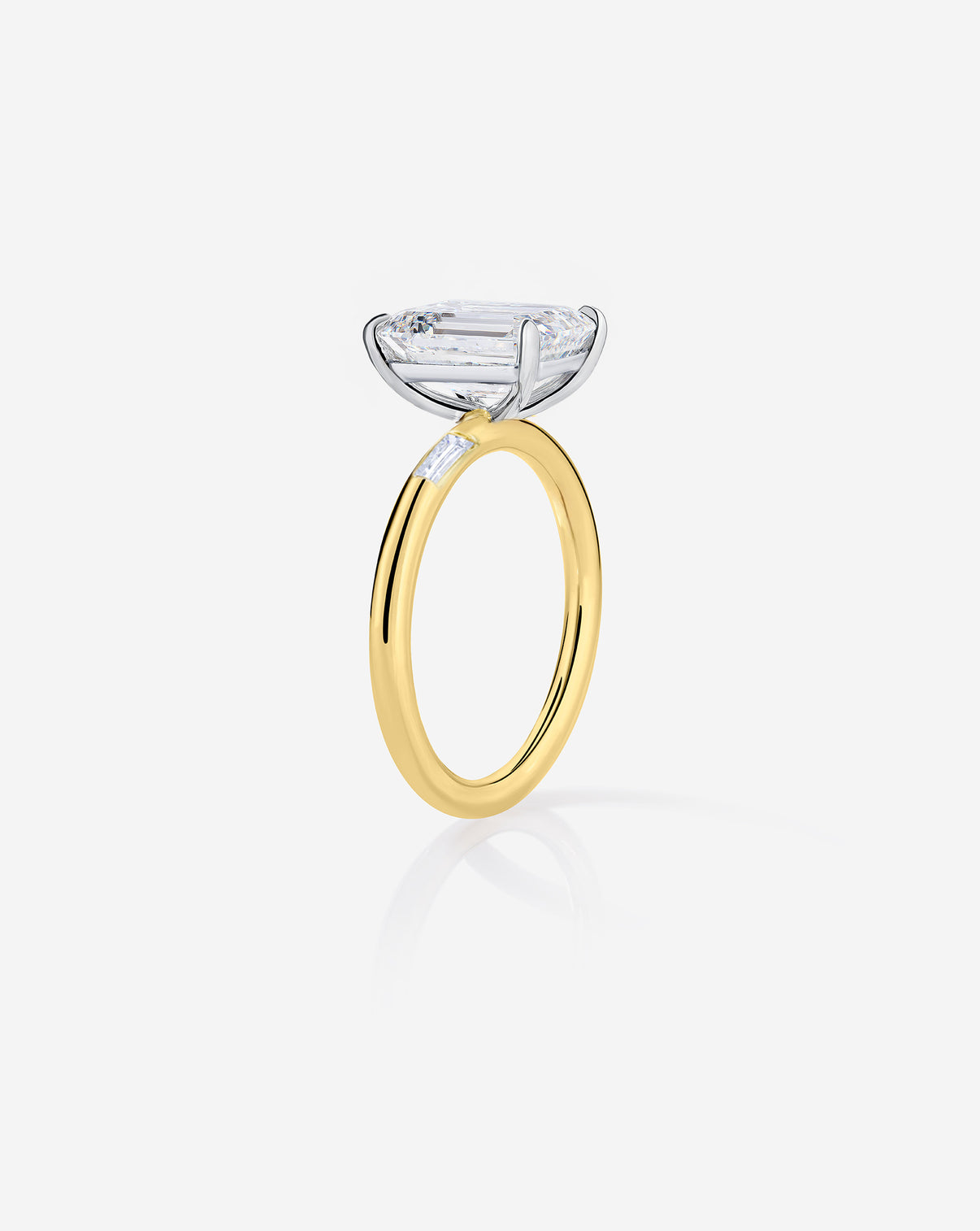 3 carat Emerald Diamond Engagement Ring in Yellow Gold Cloud Three Stone with Baguettes side view