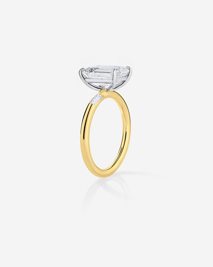 3 carat Emerald Diamond Engagement Ring in Yellow Gold Cloud Three Stone with Baguettes side view