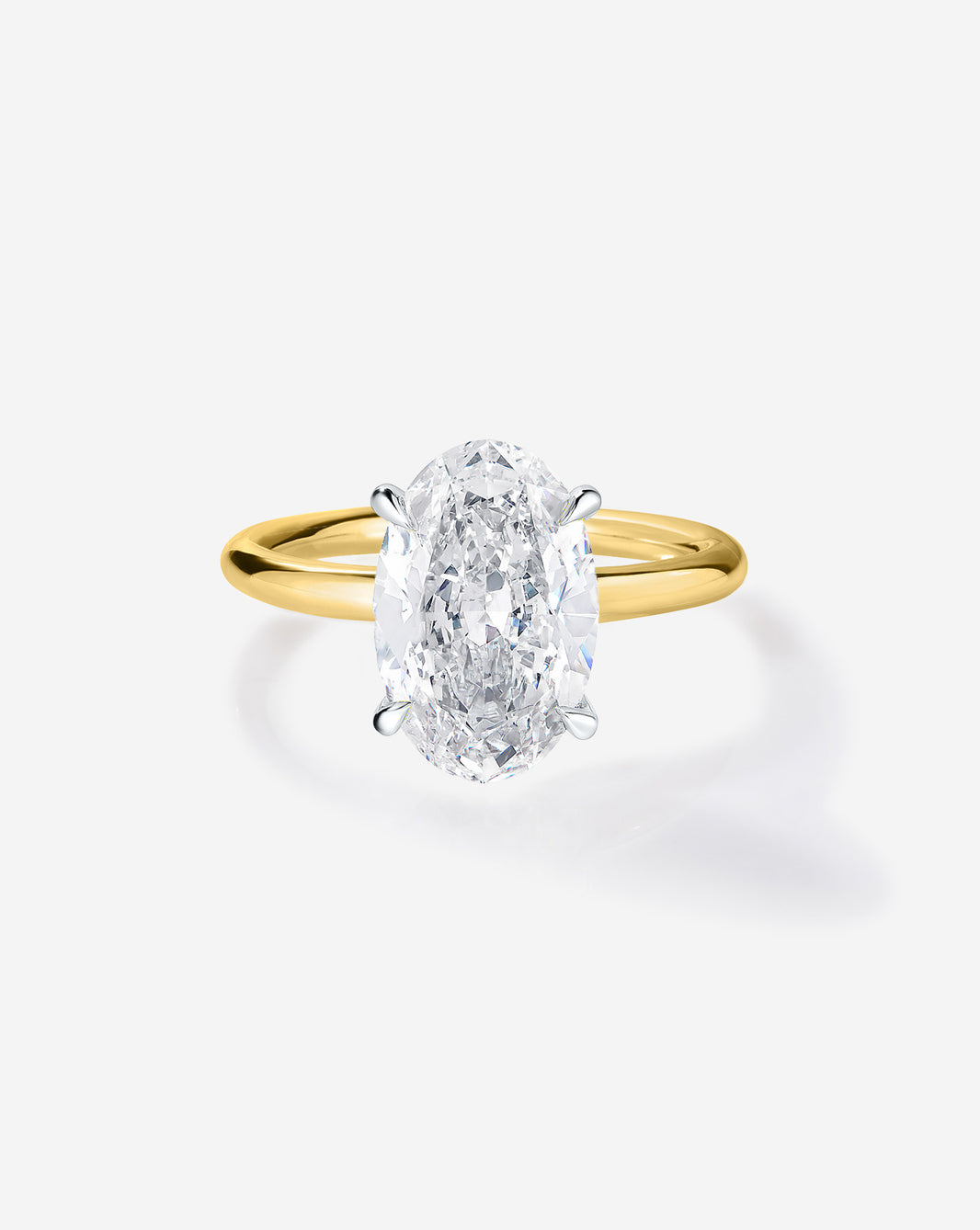 2 carat Oval Diamond Engagement Ring in Yellow Gold Cloud Solitaire setting