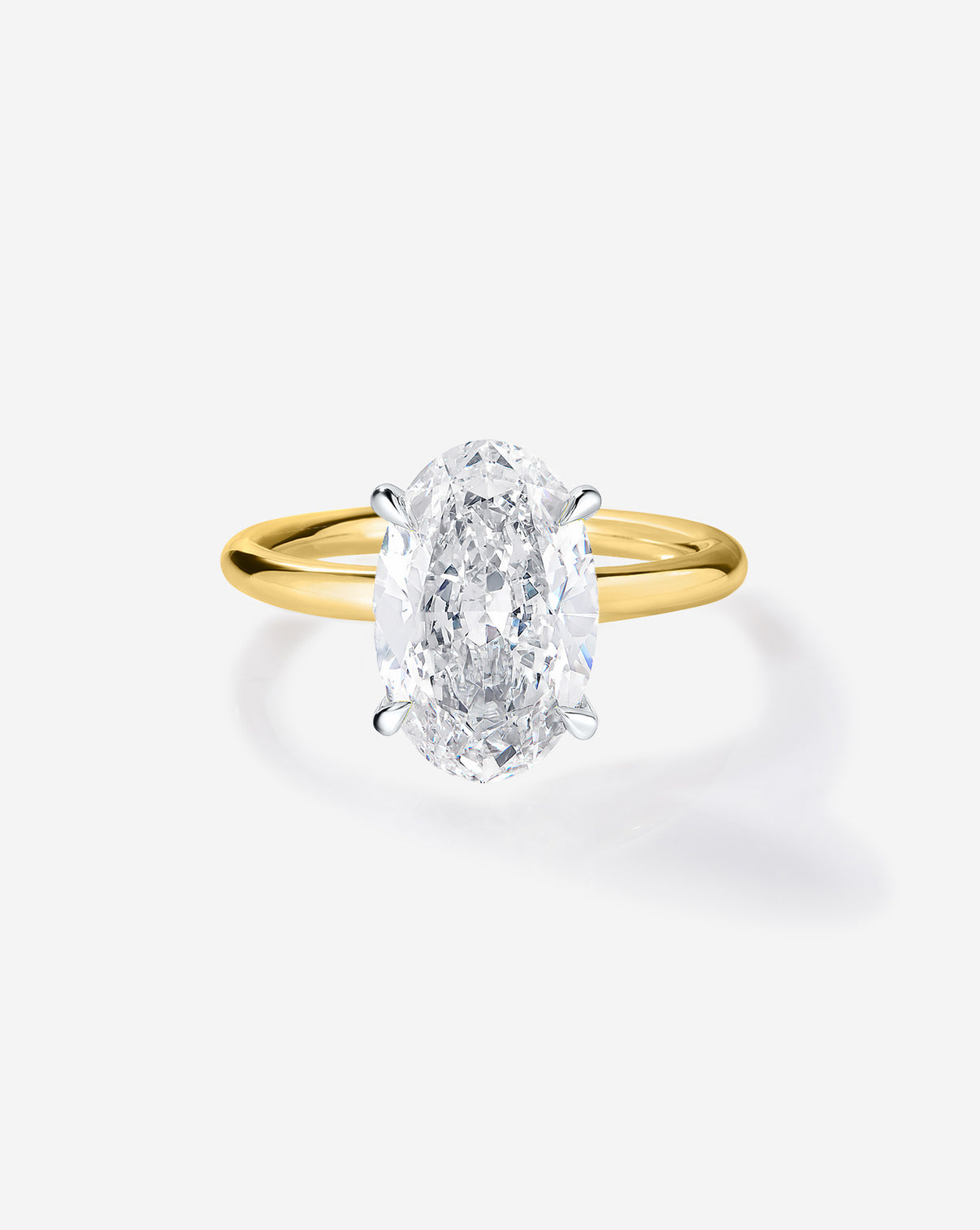2 carat Oval Diamond Engagement Ring in Yellow Gold Cloud Solitaire setting