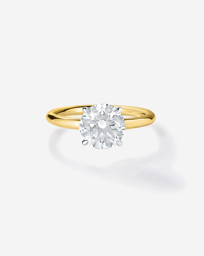 1 carat Round Diamond Engagement Ring in Yellow Gold Cloud Solitaire setting