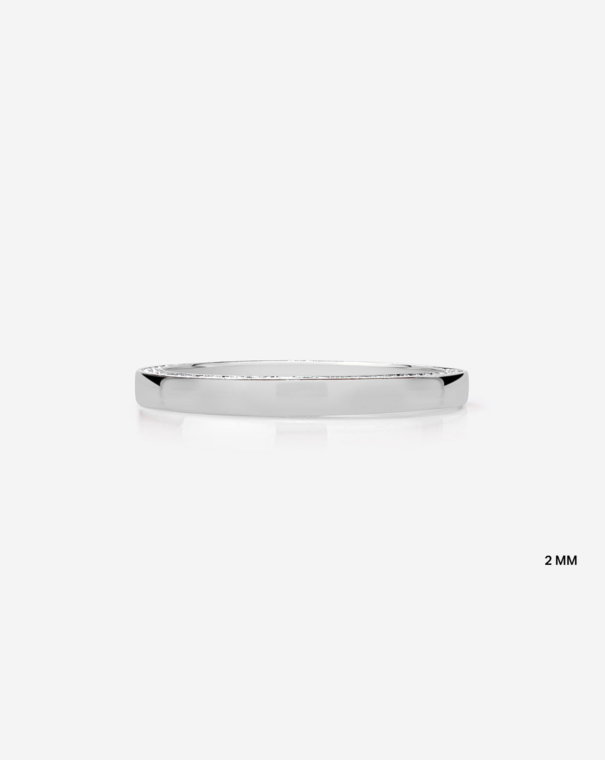 Flat lay of 2 mm brilliant pave cigar band in 14k White Gold