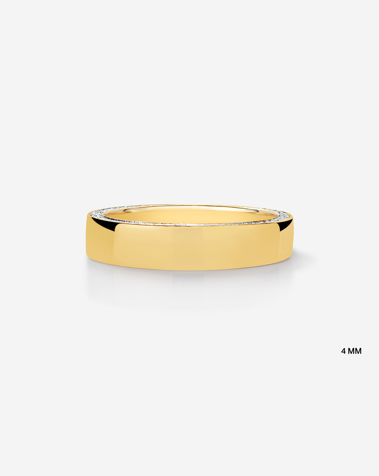 Flat lay of 4 mm brilliant pave cigar band in 14k Yellow Gold