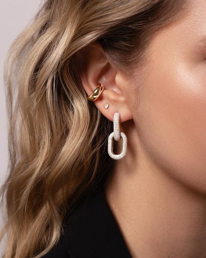 Multiway Cloud Link Earrings shown styled with the Tiny Pear Studs and Bold Gold Cloud Ear Cuff in ear