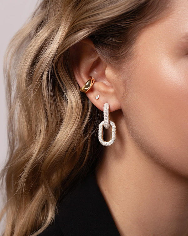 Multiway Cloud Link Earrings shown styled with the Tiny Pear Studs and Bold Gold Cloud Ear Cuff in ear