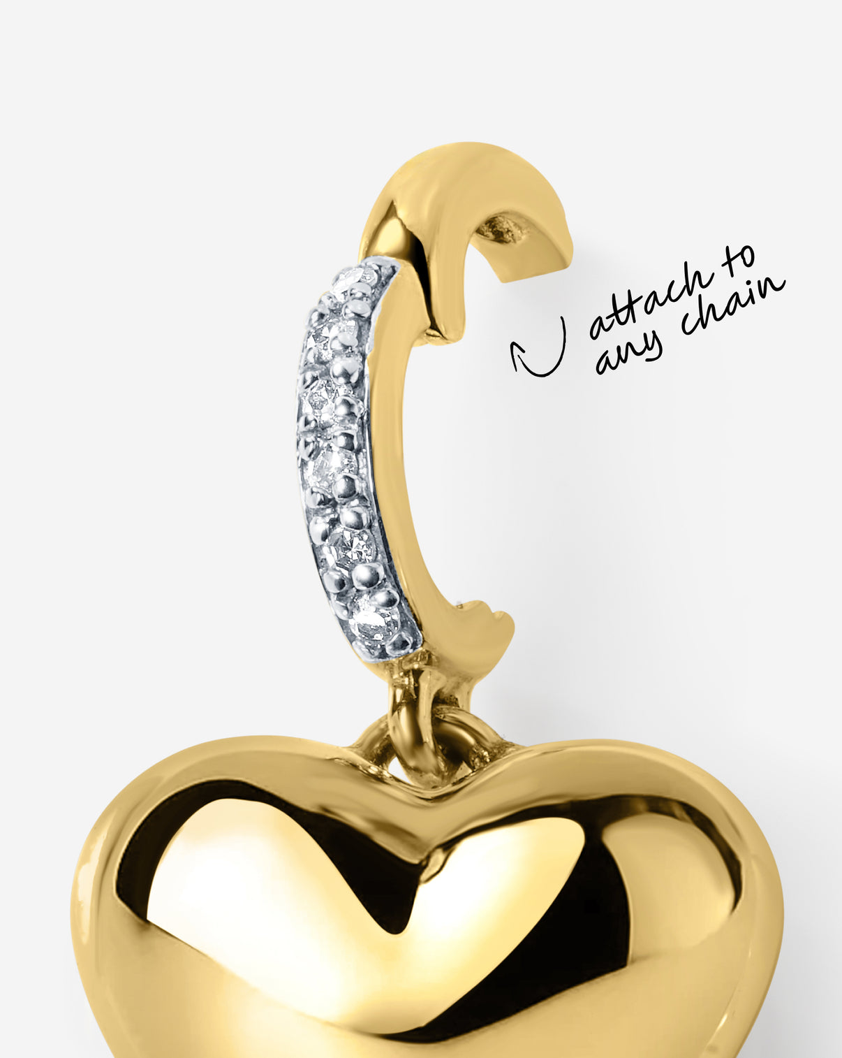 CLOSE UP OF FUNCTIONAL DIAMOND BAIL ON HEART CHARM