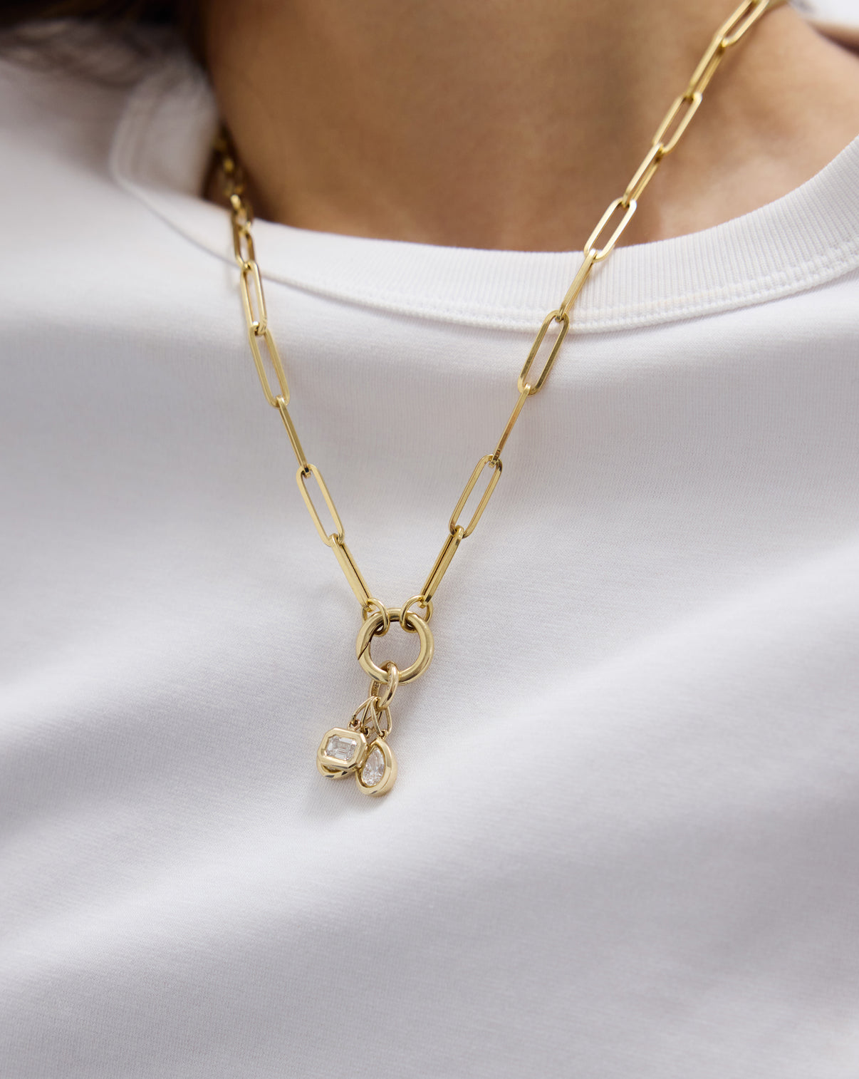 multiple pendants stacked on necklace global