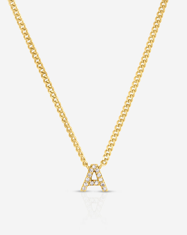 Diamond Initial Necklace flat lay letter A in yellow gold