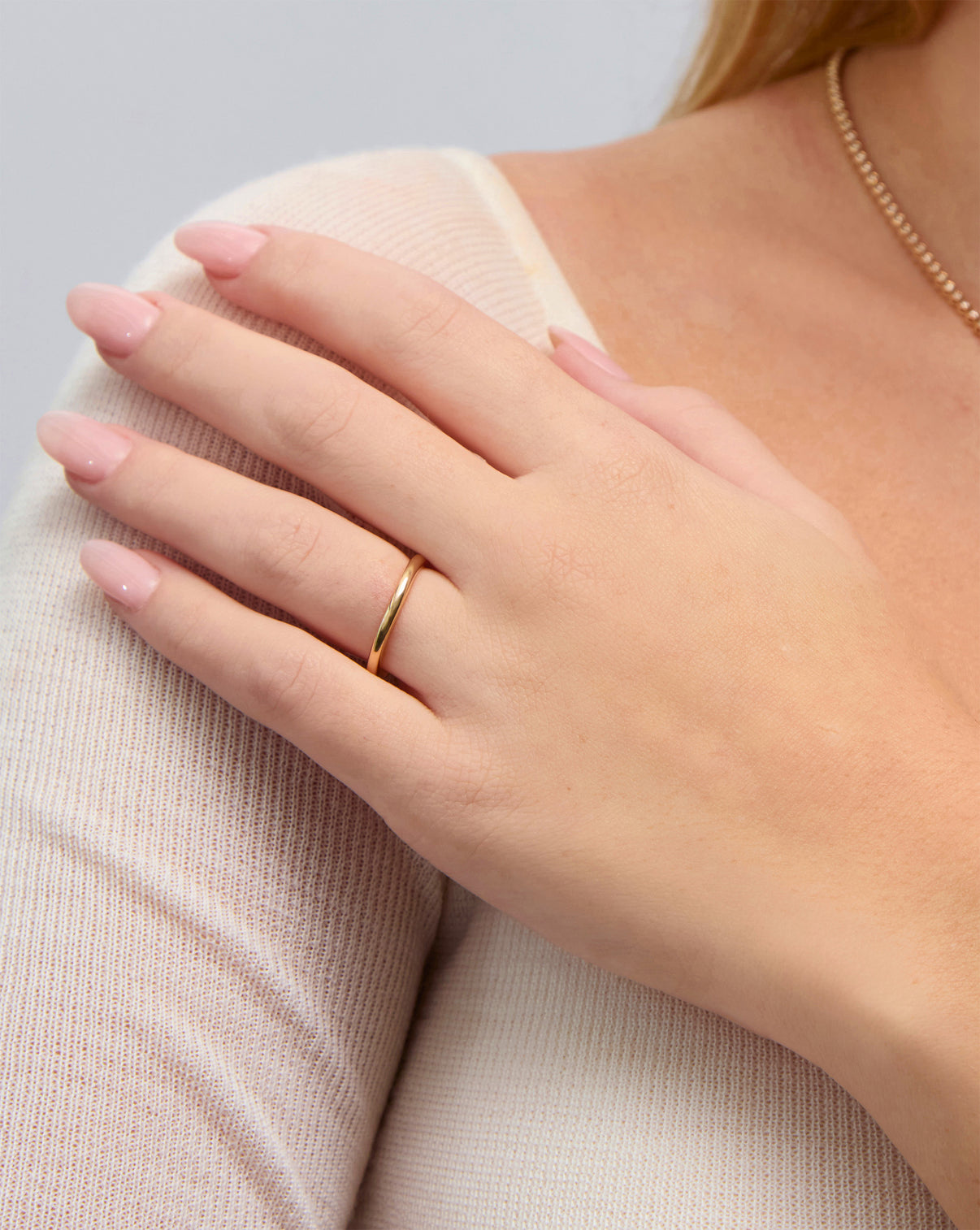 2 mm Cloud Band with Birthstone styled solo on model's finger global