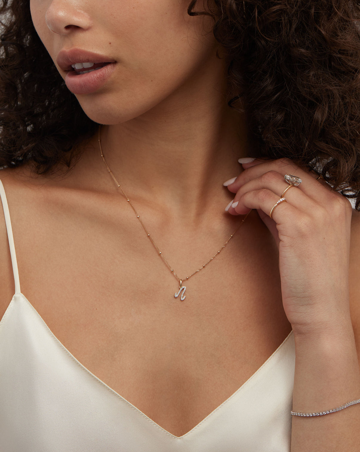 Diamond Script Initial Pendant styled on Saturn Chain Necklace on model