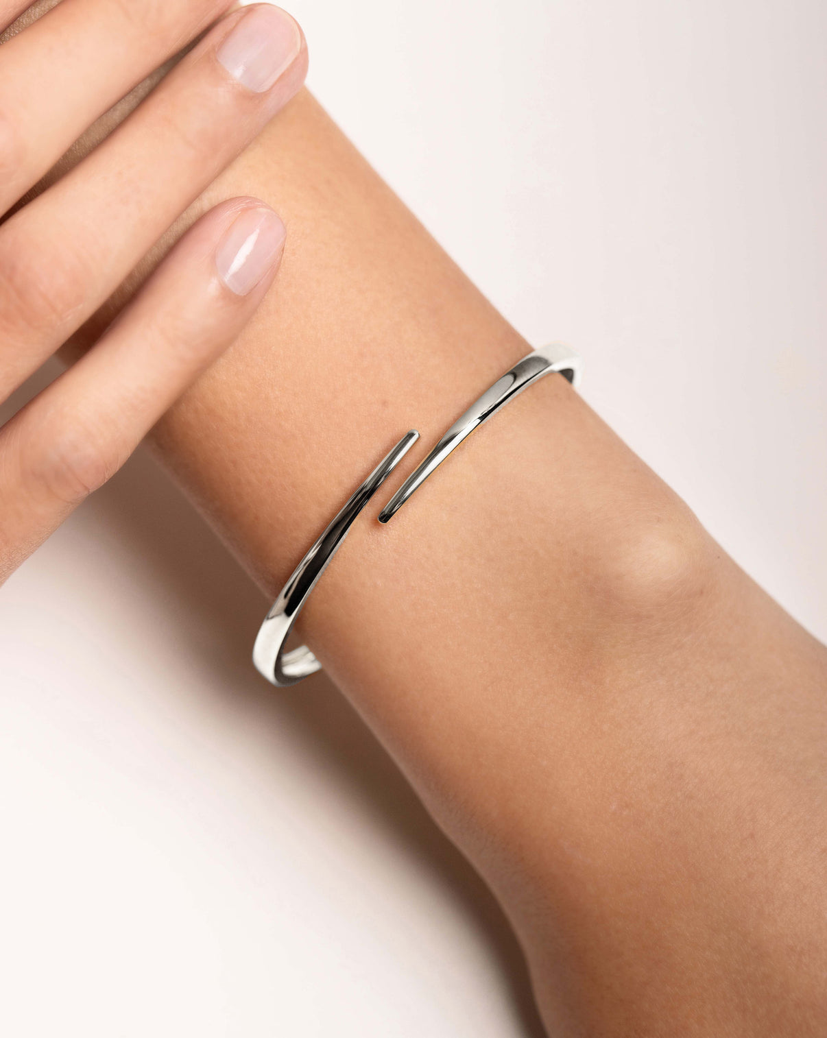 Open Wrap Gold Bangle in White Gold on model