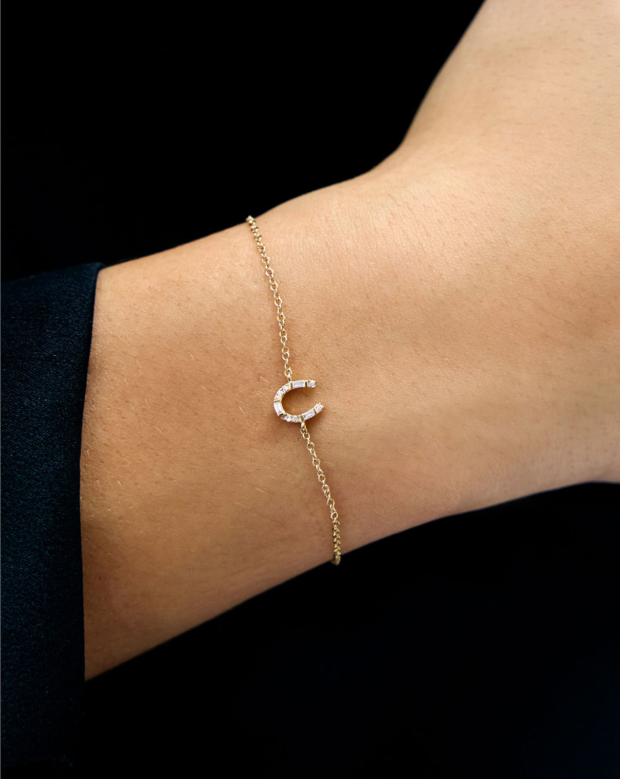 horseshoe bracelet on wrist
