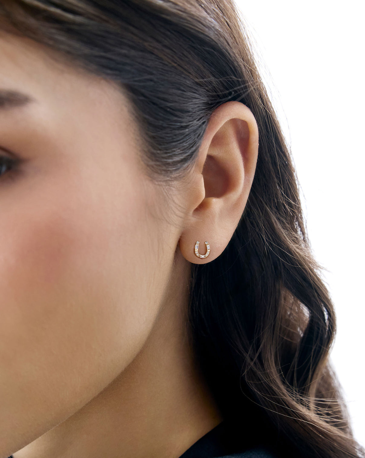 horseshoe stud shown on ear