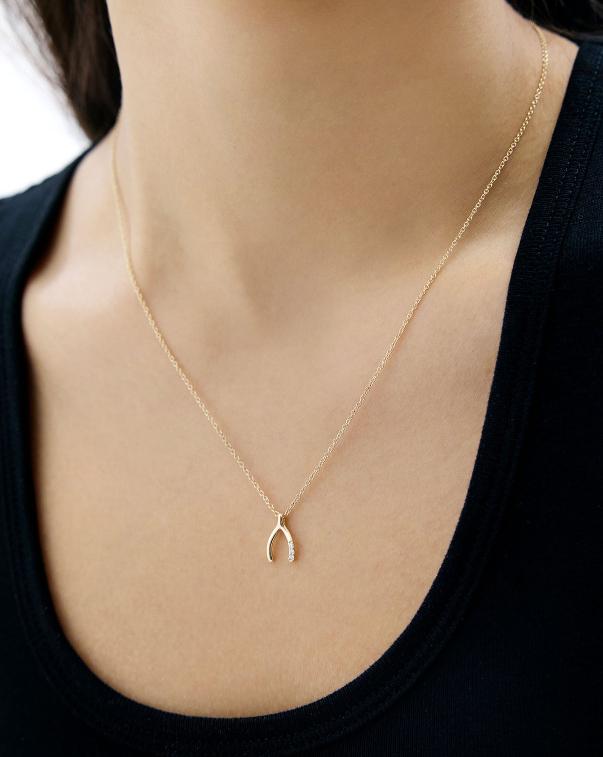 wishbone necklace shown on model