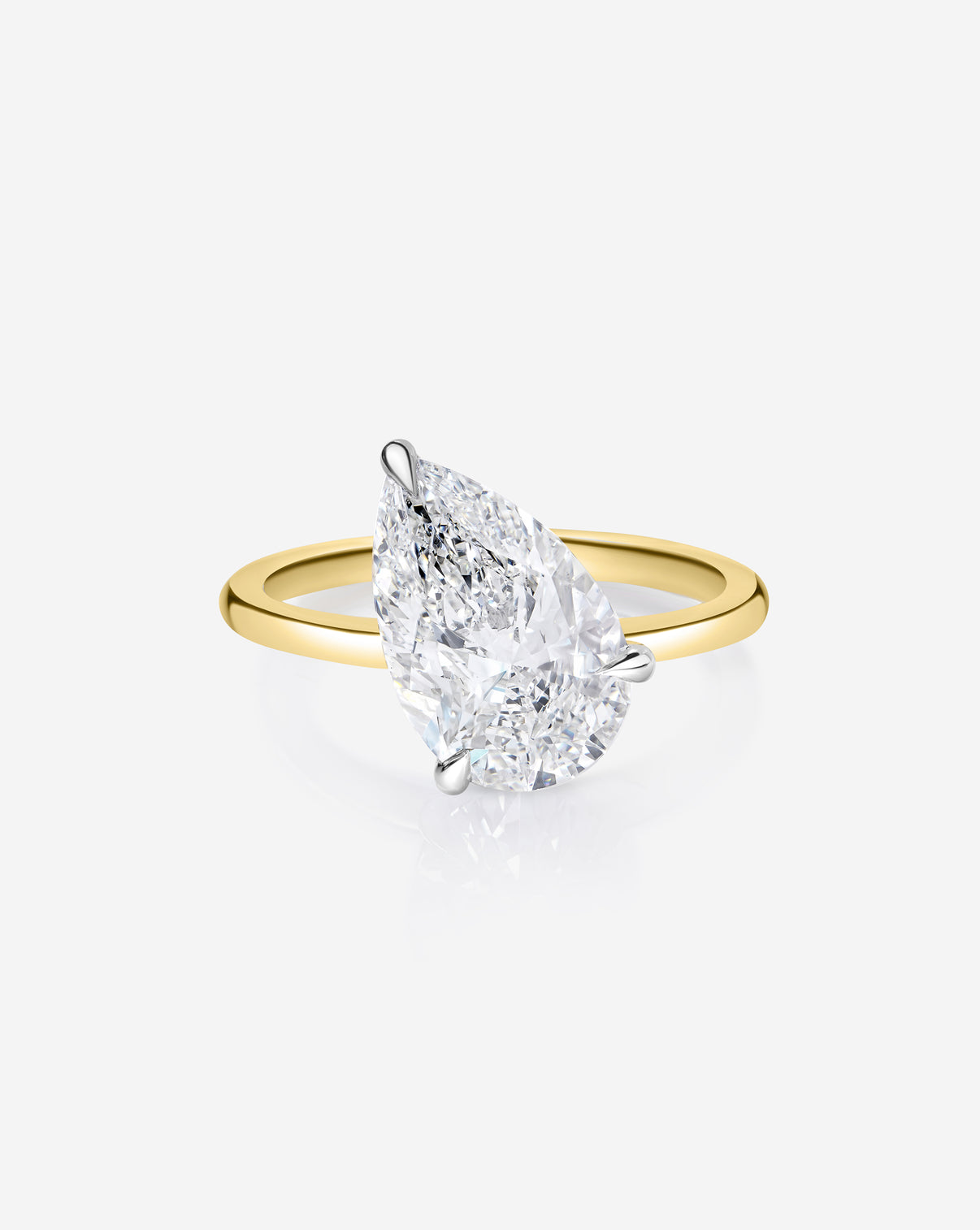 close up of the 2.10 carat Pear ring of the 4.70 Oval & Pear Whisper Thin® Duet diamond Engagement ring in 14K Yellow Gold
