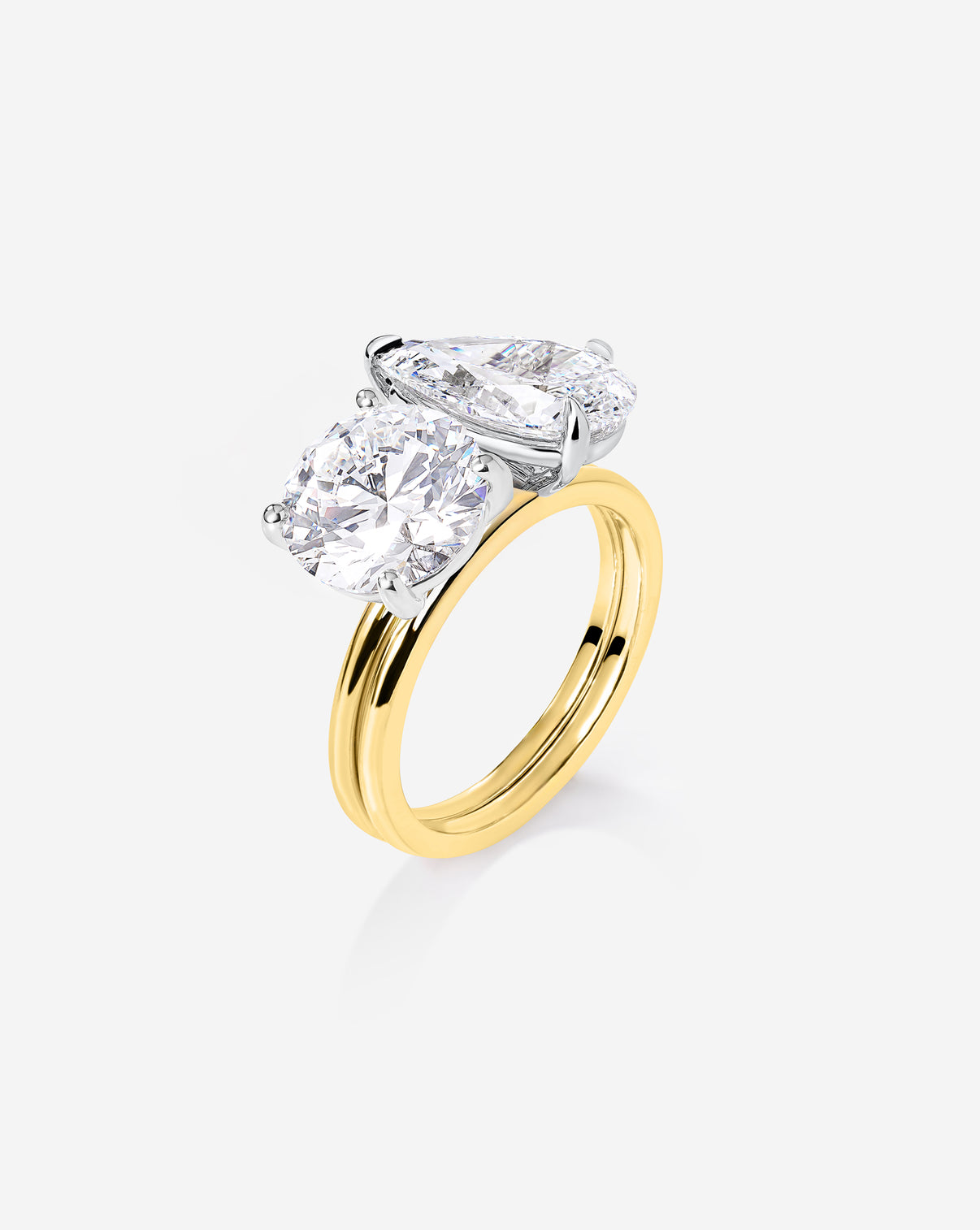 side view close up of the Stacked 4.74 Round & Pear Whisper Thin® Duet diamond engagement ring in 14K Yellow Gold