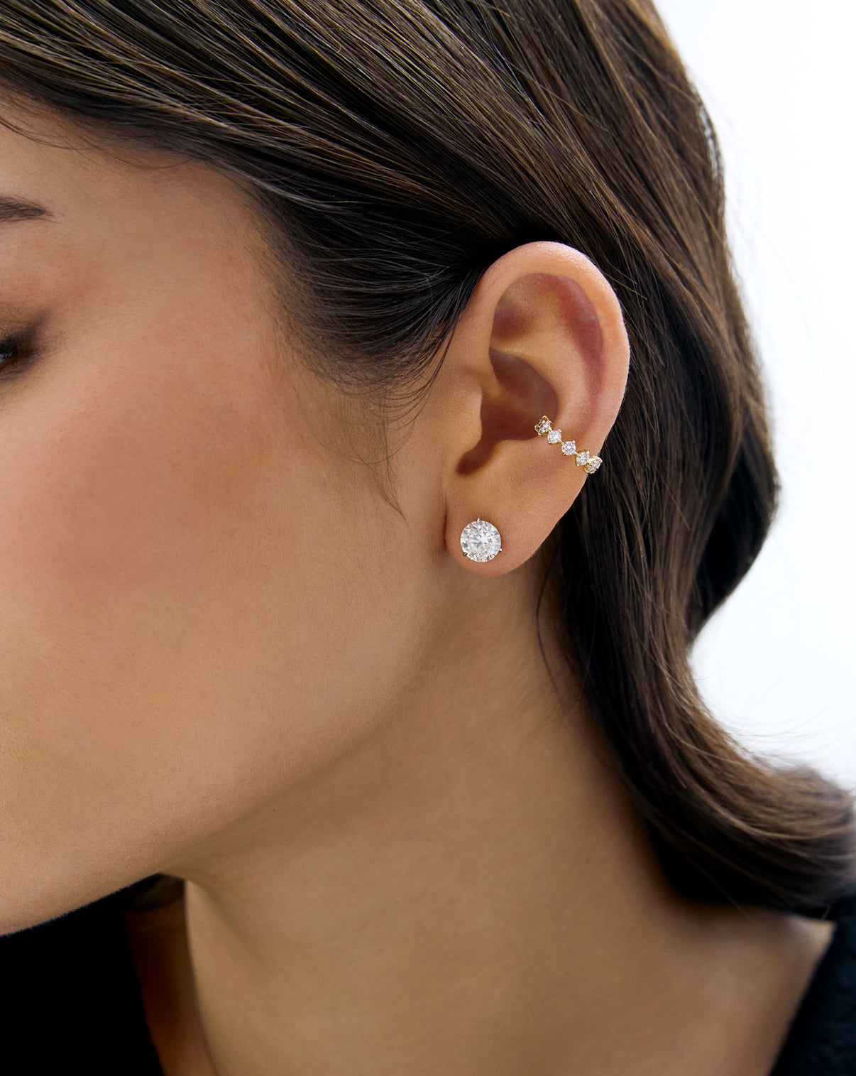 model wearing Starlight Lab Diamond Ear Cuff styled with a round diamond stud earring