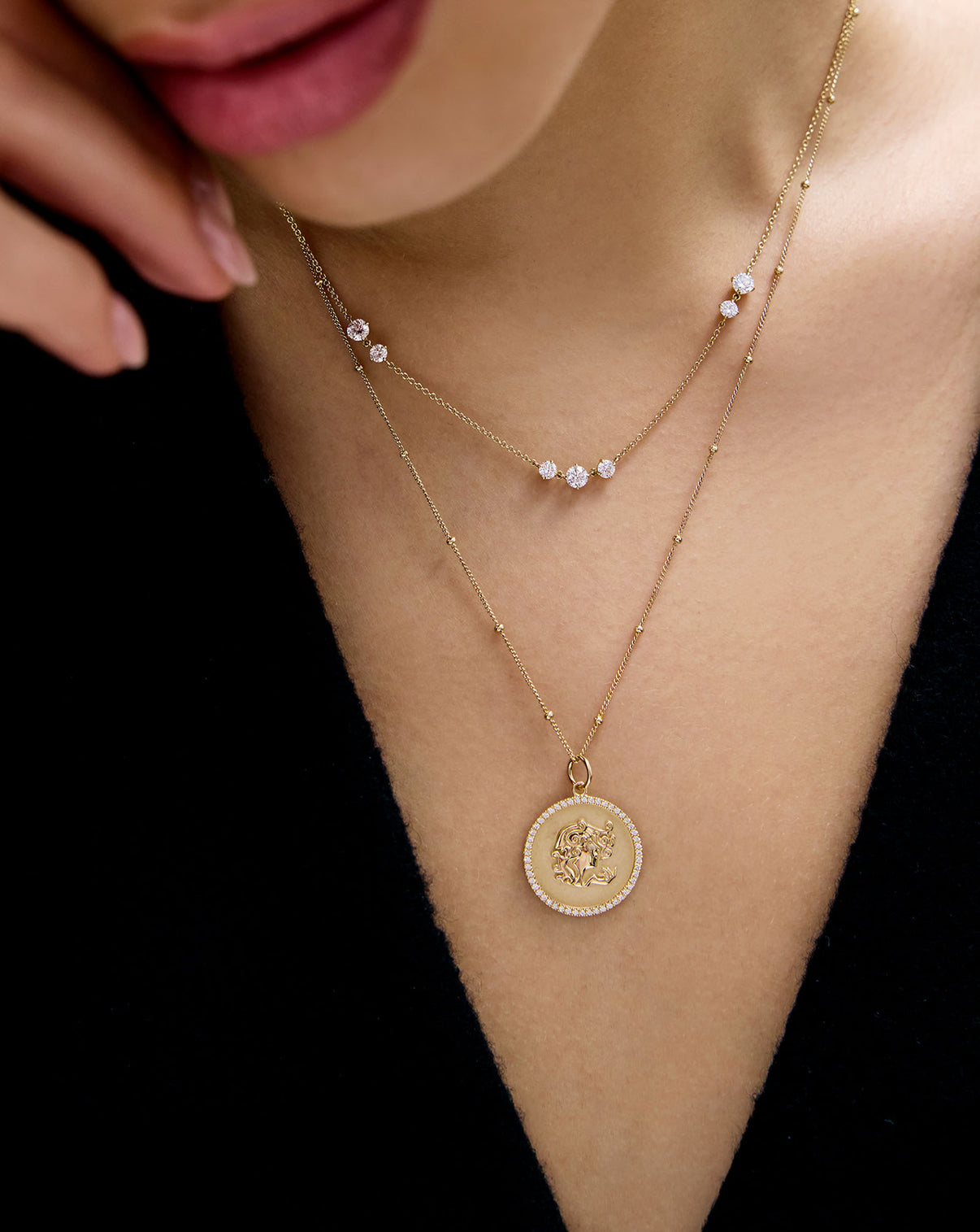 Starlight Lab Diamond Necklace styled on model with a medallion necklace