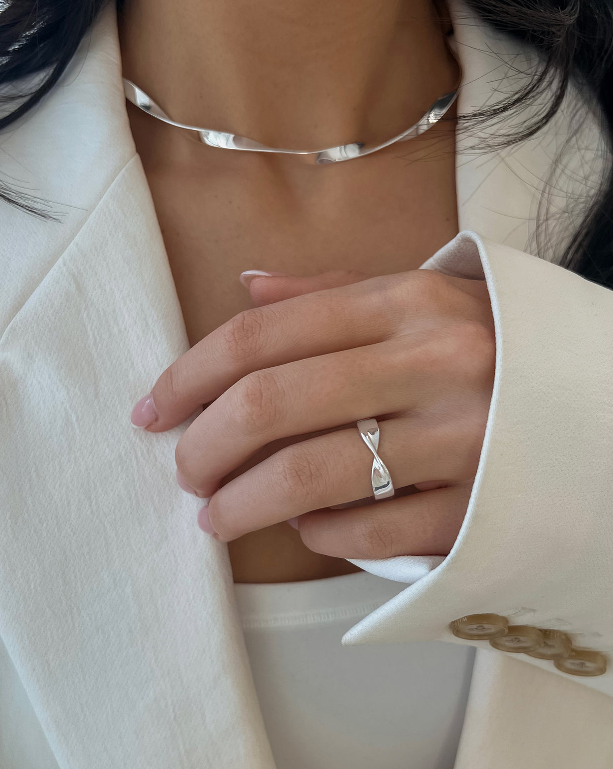 Silver Twist ring and collar necklace shown on model