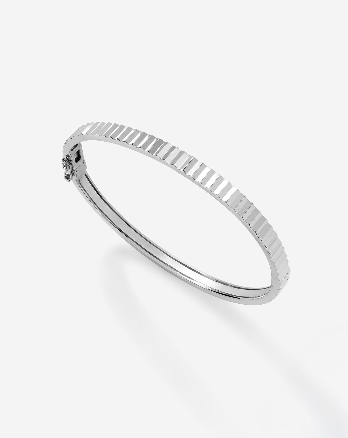 Classic 4mm Fluted White Gold Bangle product shot highlighting the luxurious ridged surface and gold brilliance side view
