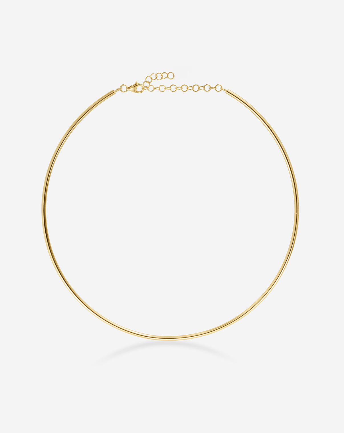 Detail shot of gold collar necklace clasp mechanism and end finishing in 14k yellow gold
