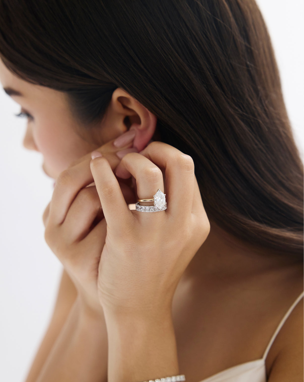 On model view of Duchess Lab Diamond in Cloud Solitaire in Yellow Gold with Eternity Band