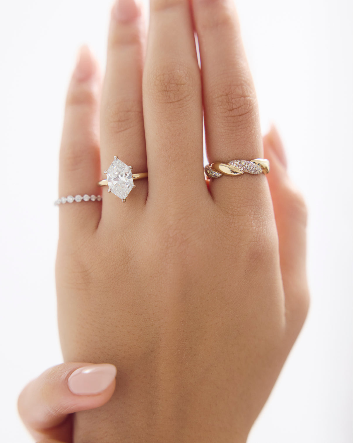 On model hand view of Duchess Lab Diamond in Cloud Solitaire in Yellow Gold with Fine Jewelry Rings