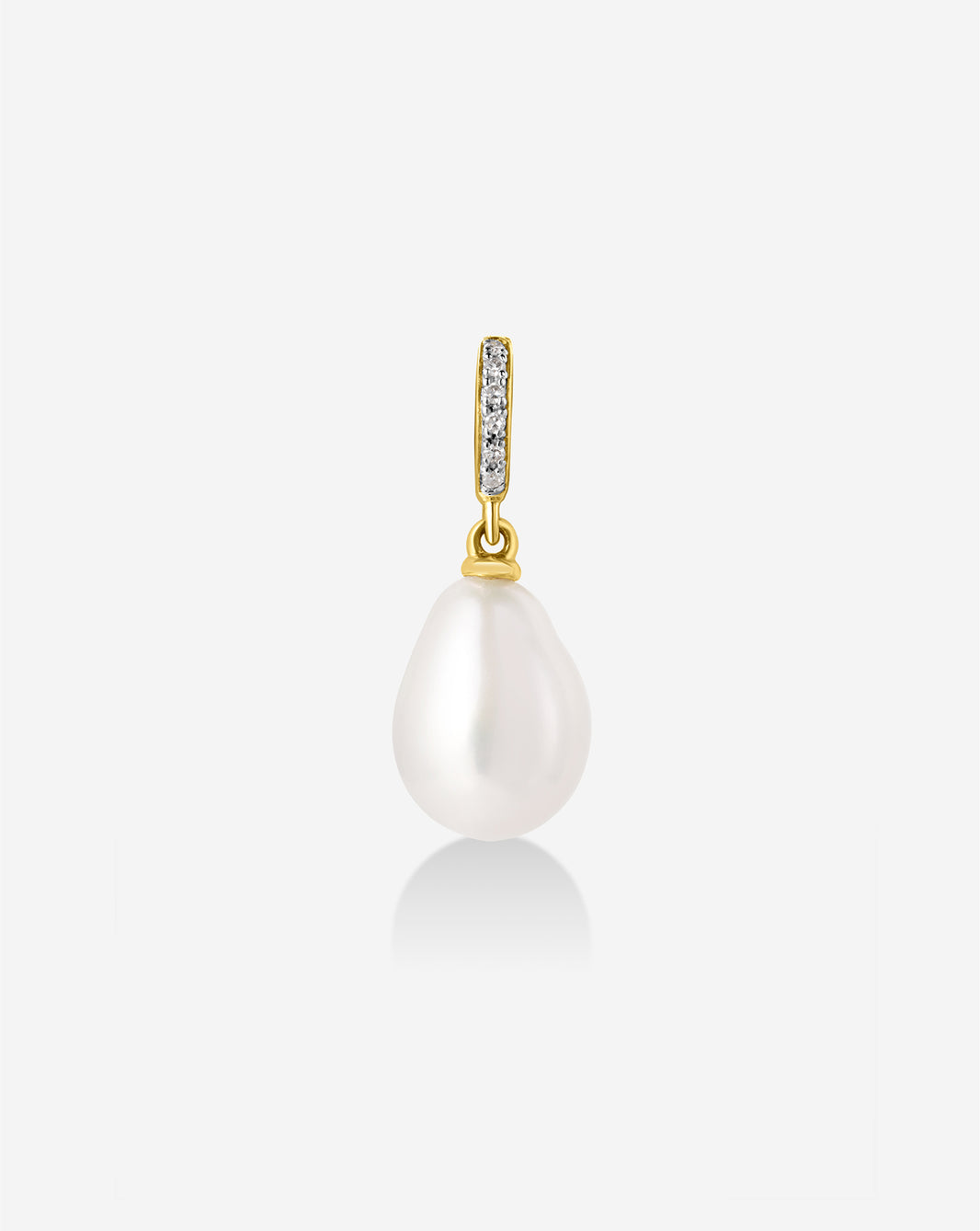 Pearl Charm featuring a lustrous freshwater pearl suspended from a gold attachment loop