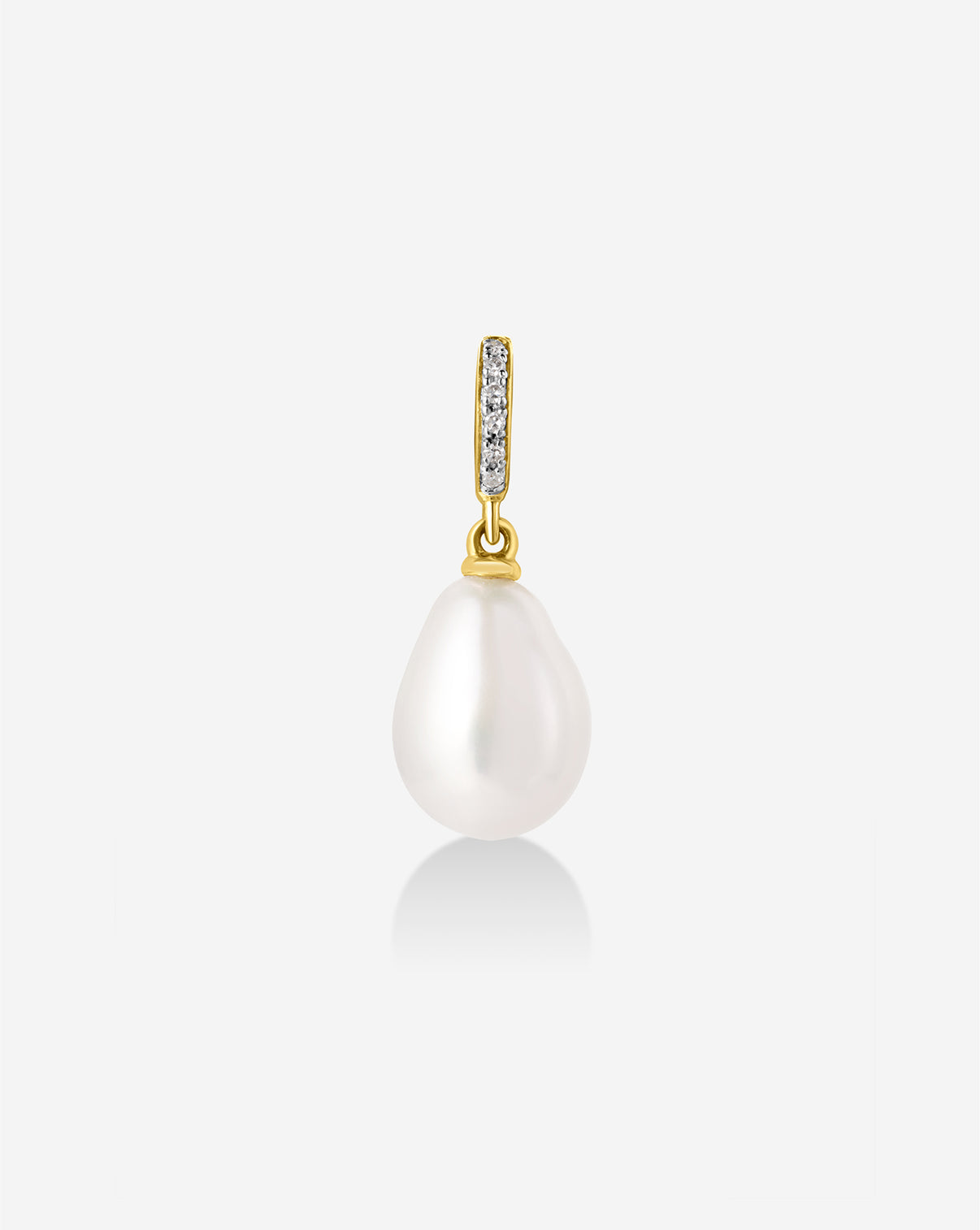 Pearl Charm featuring a lustrous freshwater pearl suspended from a gold attachment loop
