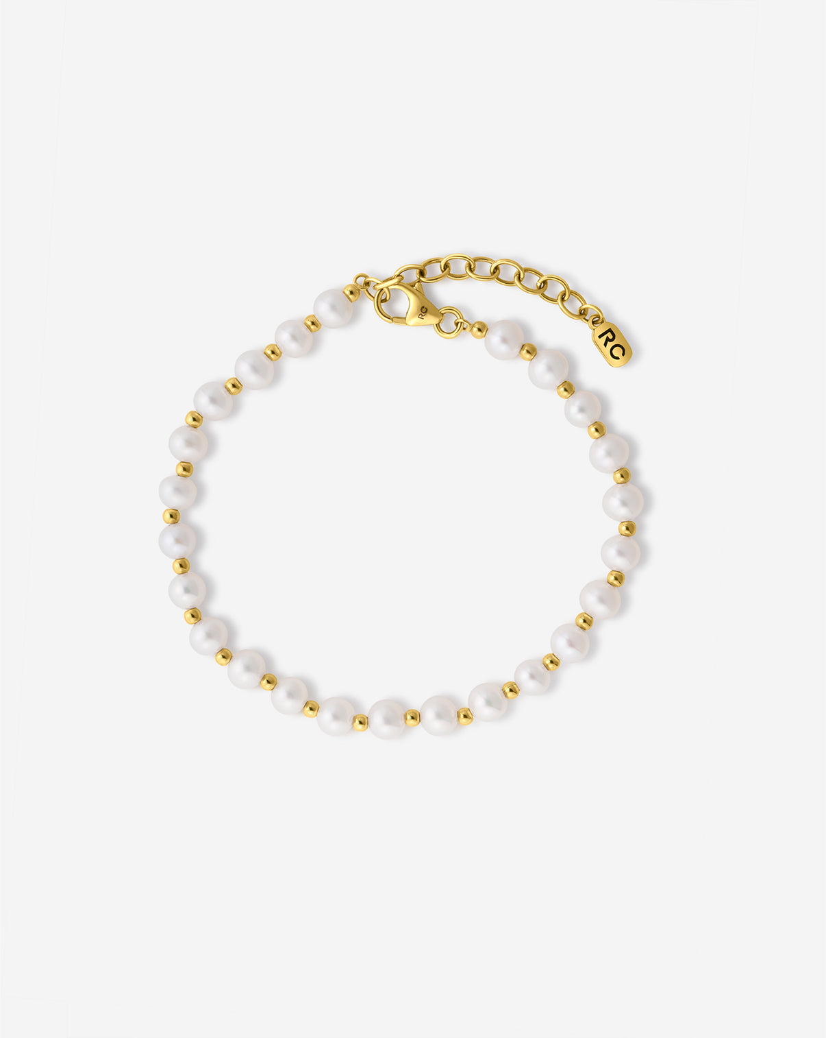 Detail shot of Pearl Station Bracelet highlighting the alternating pattern of pearls and gold beads