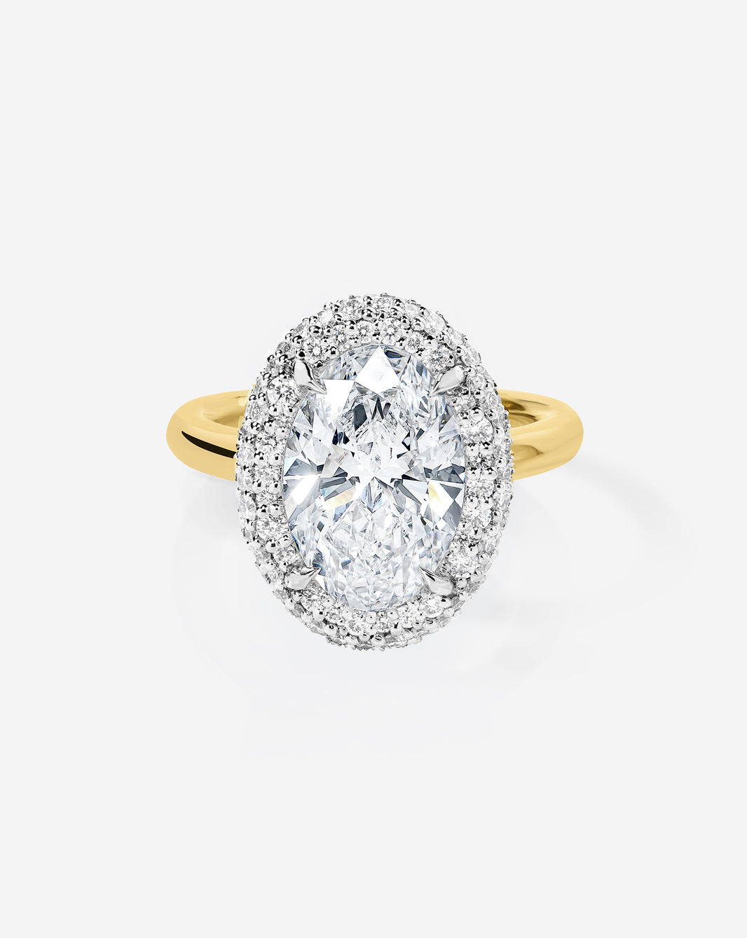 3.10 Oval Lab Diamond in Cloud Bezel with Pavé Halo in 14k yellow gold