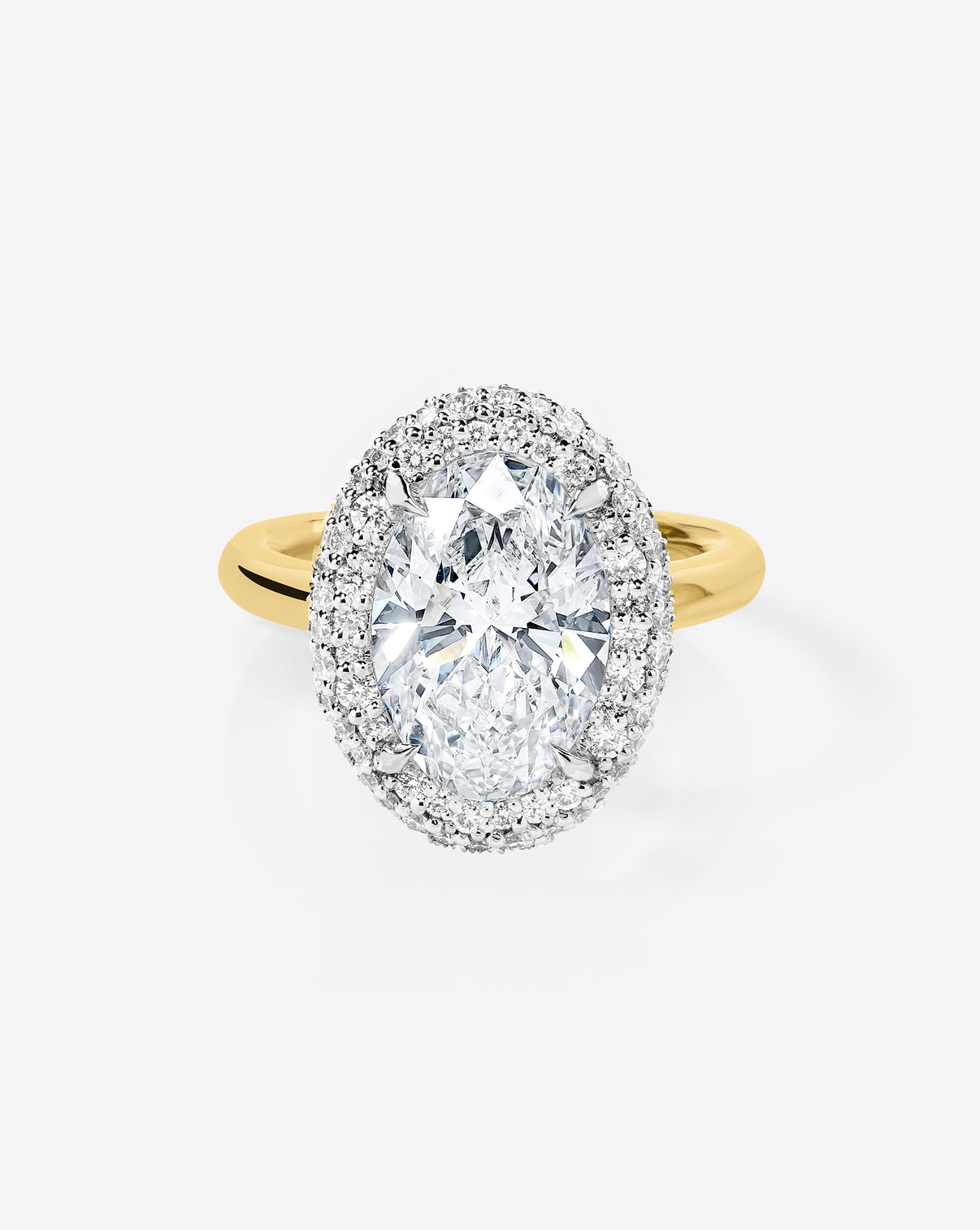 3.10 Oval Lab Diamond in Cloud Bezel with Pavé Halo in 14k yellow gold