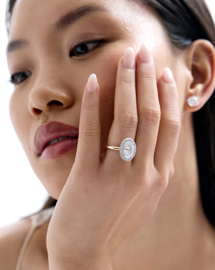Model wearing Cloud Bezel with Pavé Halo in Yellow Gold 44181311979608 44181328461912 44181328494680