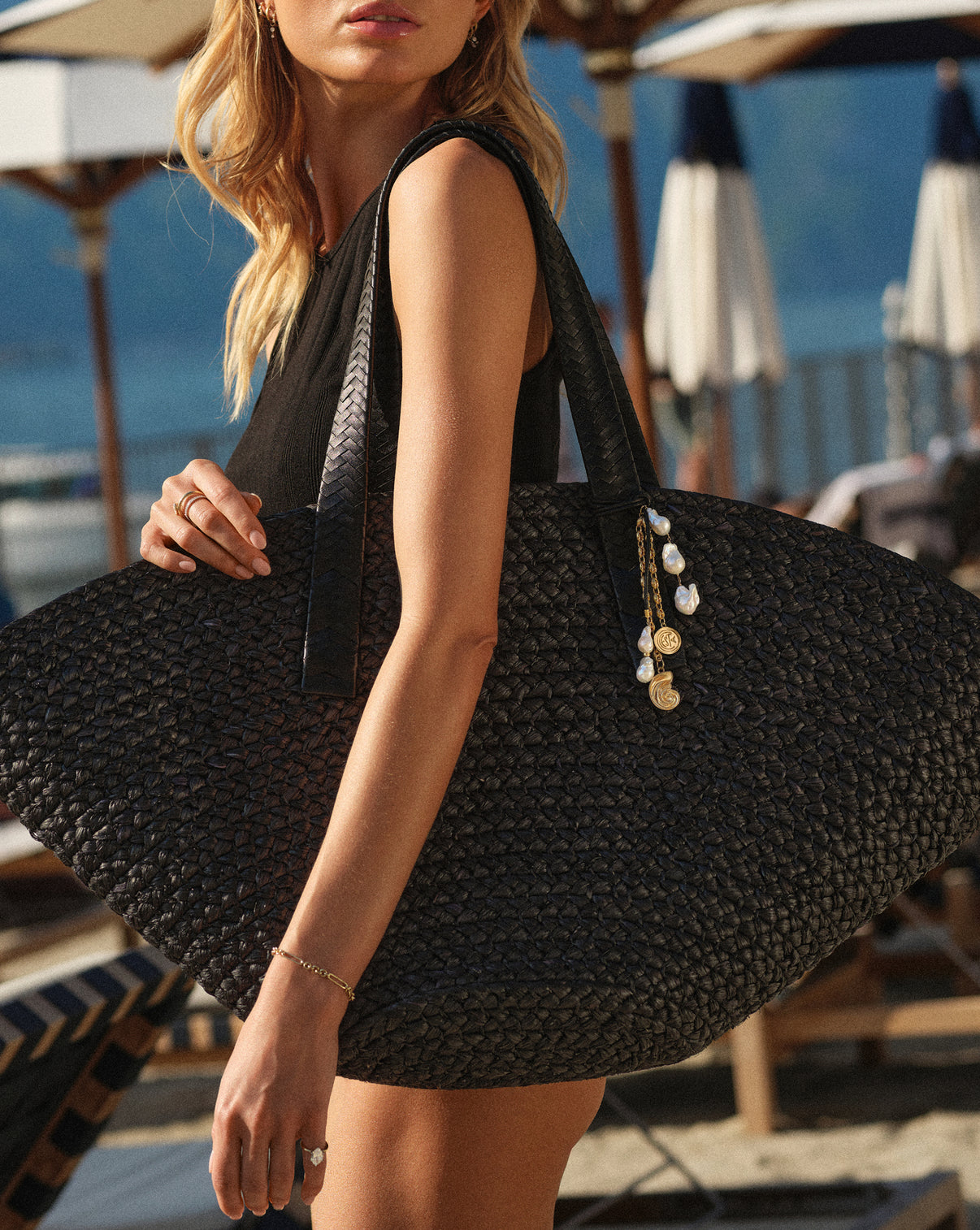 Close up side view of the RC x Cesta Charmed Taco Tote in Black color