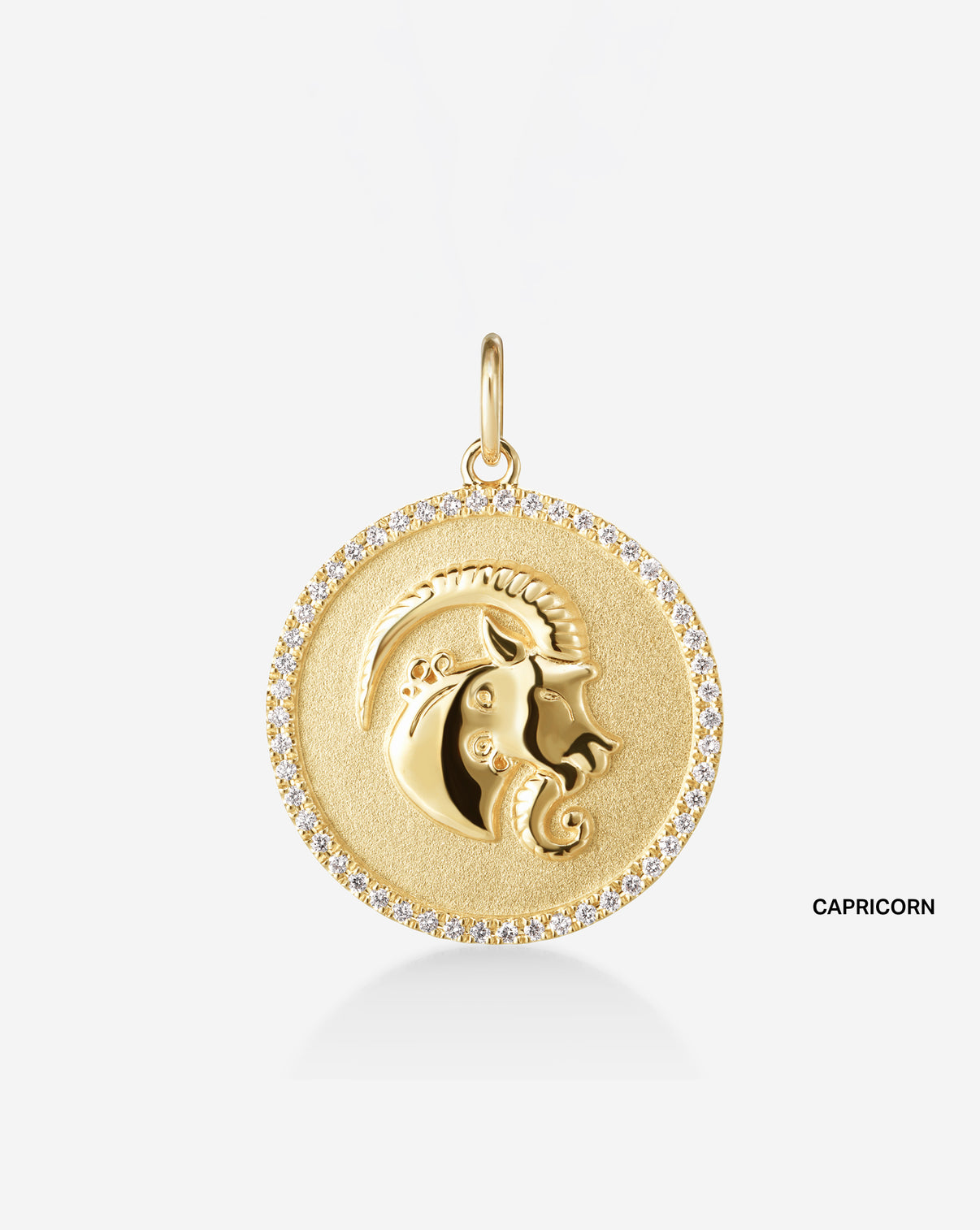 Medallion pendant featuring 50 round natural diamonds and the Capricorn Zodiac sign