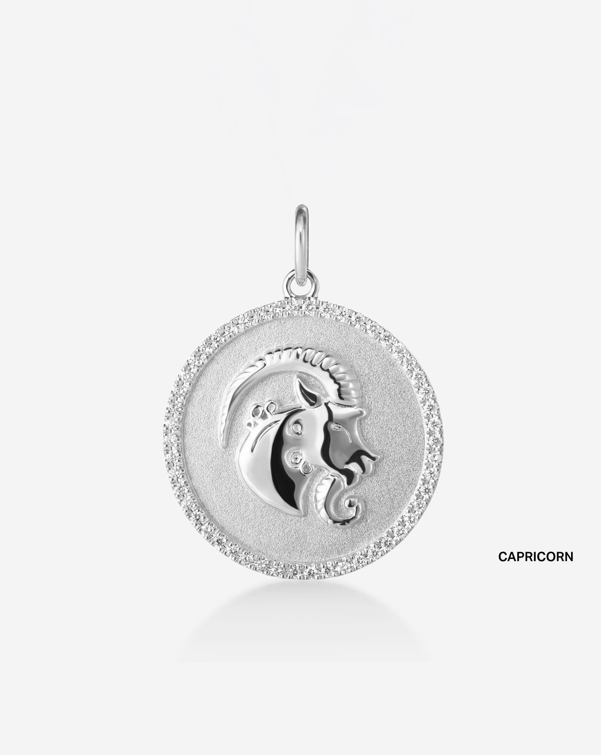 Medallion pendant featuring 50 round natural diamonds and the Capricorn Zodiac sign