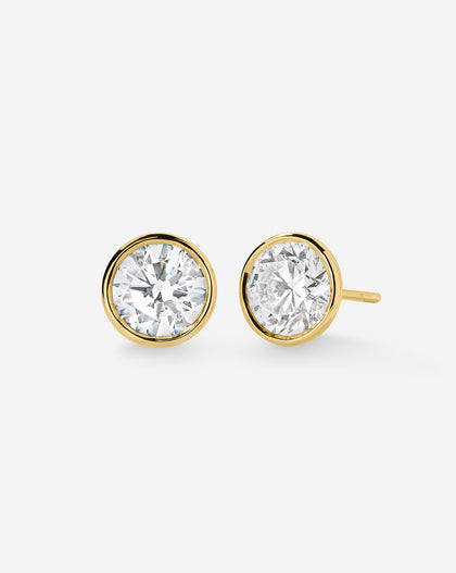 Lab Diamond Round Bezel Studs in 14K Gold against white background global