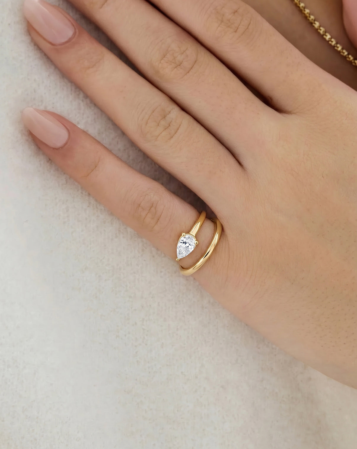 pear cut Lab Diamond Double Coil Ring
shown on pinky finger