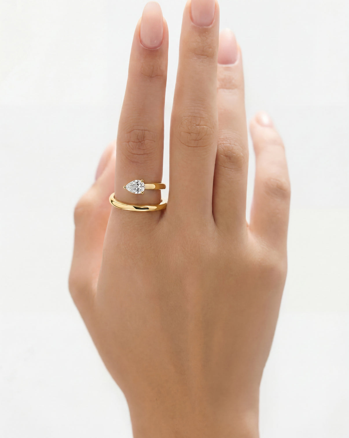 Lab Diamond Double Coil Ring worn on pointer finger