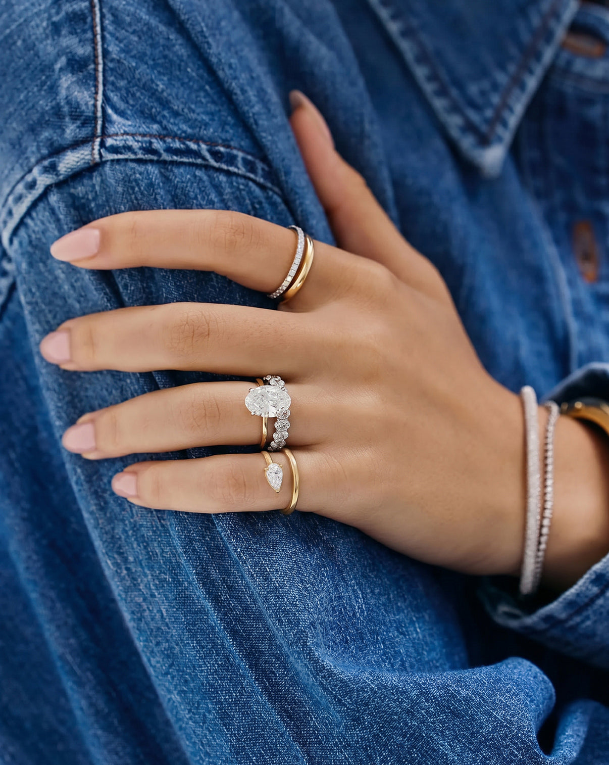pear cut Lab Diamond Double Coil Ring
shown styled with other rings