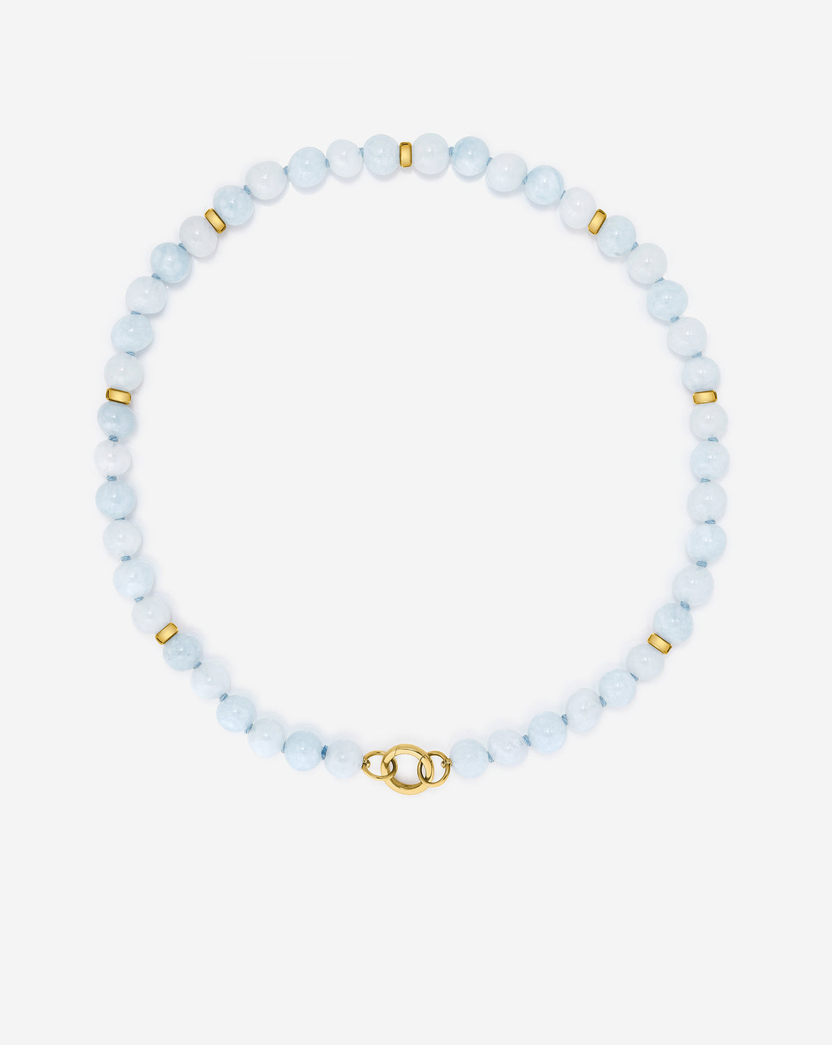 Overhead view of our Capri Coast Necklace laying flat on white surface