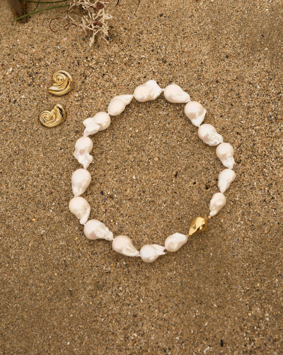 Baroque Pearl Necklace styled with Shell Earrings, creating a coordinated beach-inspired look