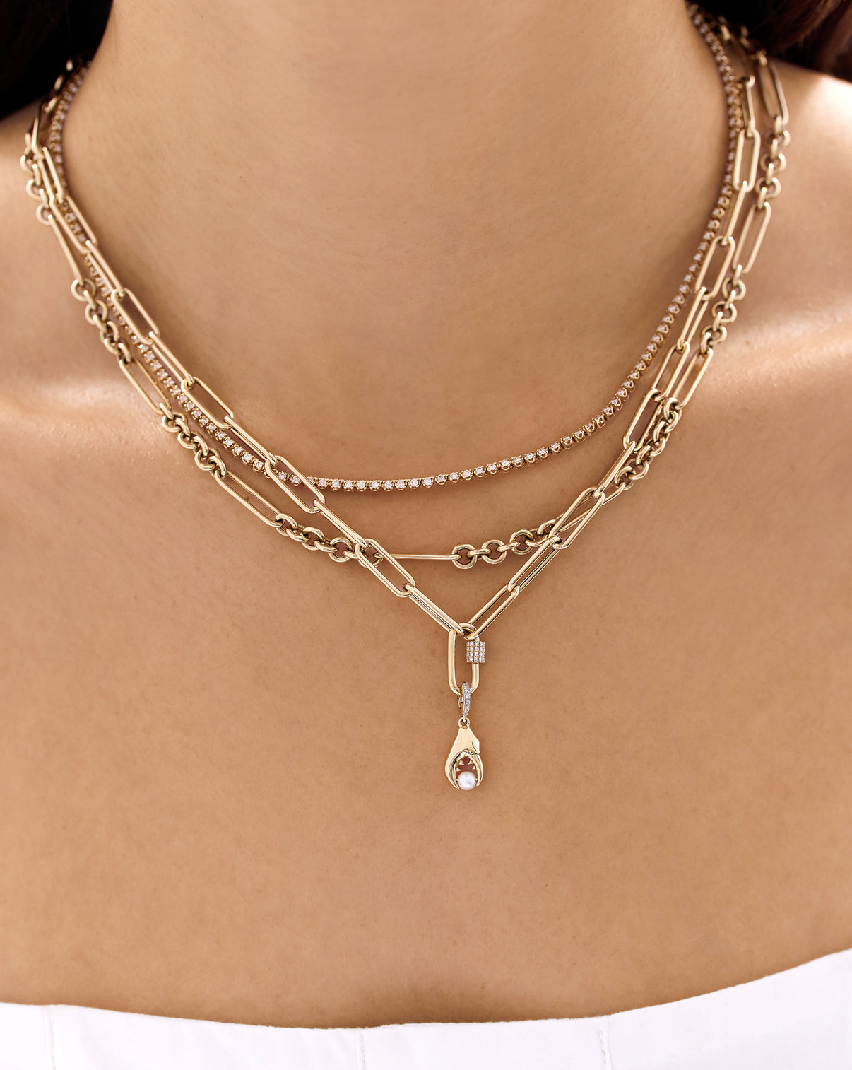 Pinch Me Pearl Charm on a gold chain link necklace with carabiner