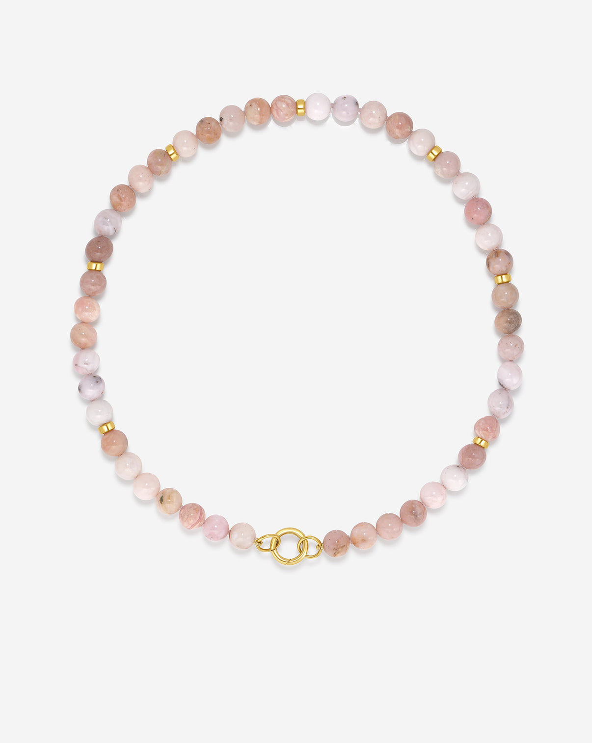 Overhead view of our Pink Paloma Necklace laying flat on white surface